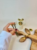 تصویر چنگال زیتون خوری سفید طلایی 