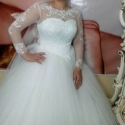 تصویر لباس عروس دانتل آستیندار 