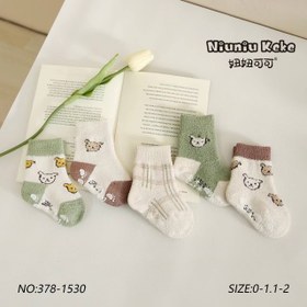 تصویر جوراب بوکله نوزادی بچگانه گرم و نرم نیمساق پاییزی و زمستونی کف استپ دار مدل تدی کلاسیک 