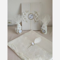 تصویر ست بله برون سفارشی شامل دفتر و قندساب و خودکارپر و پارچه عقد همراه چهار عدد تگ اسم 