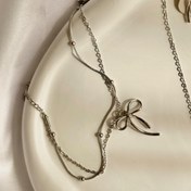 تصویر دستبند دولاین توپی 