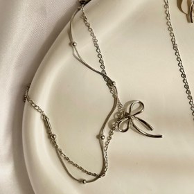 تصویر دستبند دولاین توپی 