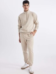 تصویر شلوار گرمکن مردانه بژ | A6468AX23AU Defacto 