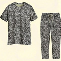 تصویر ست تی شرت و شلوار راحتی زنانه جنس گیاهی طرح گل سیاه سفید 