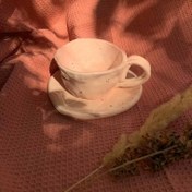 تصویر فنجان و زیرفنجانی صورتی 