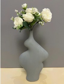 تصویر گلدان دفرمه بزرگ پلی استری 