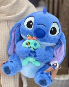 تصویر عروسک استیچ لیلو بدست 