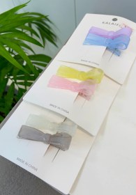 تصویر پک گیره طرح کراوات رنگ پاستلی - صورتی زرد 