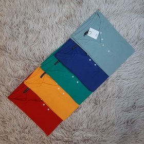 تصویر تیشرت ورزشی یقه هفت برند کیدی قواره دار رنگبندی دارد کیفیت فوق العاده تنخور بی نظیر 