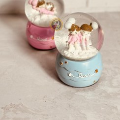 تصویر گوی موزیکال کوکی چرخان بزرگ طرح دختر و پسر برفی کد 7591 