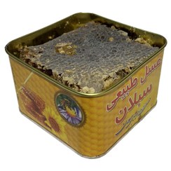 تصویر عسل طبیعی موم دار 