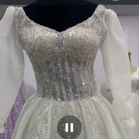 تصویر لباس عروس و لباس مجلسی.فروش عمده و تکی سایز بندی متفاوت.سایز36تا52.ارسال رایگان می باشد 