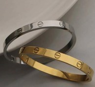 تصویر دستبند النگویی طرح کارتیر داخل حک شده طلایی نقره ای 