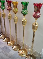 تصویر شمعدان مذهبی کنار منبری پایه بلند لاله 