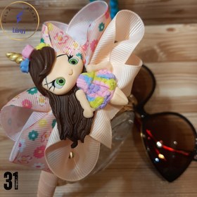 تصویر تل عروسکی 