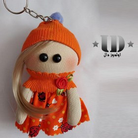 تصویر آویز عروسکی نارنجی 10 سانتی 