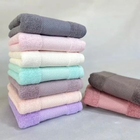 تصویر حوله دستی طرح گلدن کارینا 