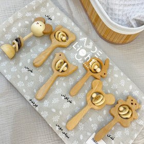 تصویر جغجغه چوبی عروسکی 