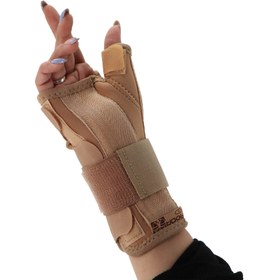 تصویر مچ شست بند دوطرفه نئوپرنی آدور ا Ador Neoprene Thumb Wrist Splint With Hard bar Ador Neoprene Thumb Wrist Splint With Hard bar