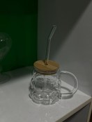 تصویر لیوان اسموتی حبابی دسته دار در دار 