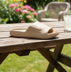 تصویر دمپایی مردانه نایکی NIKE وارداتی رویه ساده کفی EVA رنگ قهوه ای 