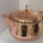 تصویر قابلمه مس درسایزهای مختلف Copper pots in different sizesأوانی نحاسیة بأحجام مختلفة