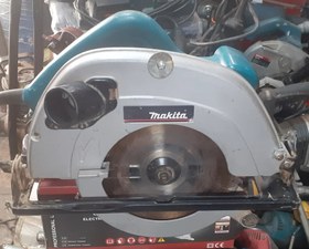 تصویر اره دیسکی گرد بر ماکیتا ژاپن اصلی مدل Makita 5704R همراه تیغه اصلی در حد نو 