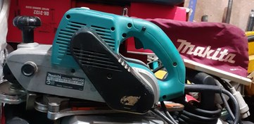 تصویر سنباده زن تانکی غلطکی نواری ماکیتا ژاپن اصلی مدل makita MBS400 استوک 