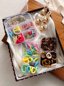 تصویر کش و‌ گیره مو رنگی و پیکسلی 