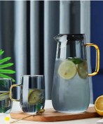 تصویر پارچ و لیوان پیرکس دودی دسته طلایی 