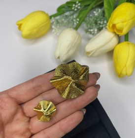 تصویر دکمه فلزی دفرمه ایتالیایی 