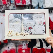 تصویر ست لباس نوزادی۱۹تیکه طلایی نادیا 