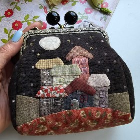 تصویر کیف دهانه فلزی 