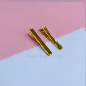 تصویر گیره انبری طلایی 