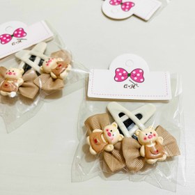 تصویر گیره تق تقی عروسکی گیره تق تقی