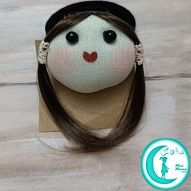 تصویر کش مو عروسکی 01 
