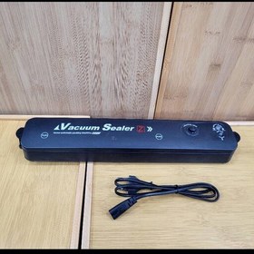 تصویر دستگاه پرس وکیوم خانگی vacuum sealer با کیفیت عالی مناسب پرس پ بسته بندی مواد غذایی 