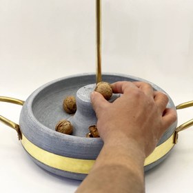 تصویر گردوشکن سنگی 