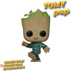 تصویر فیگور ۹ سانتی گروت با لباس کریسمس 