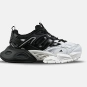 تصویر کفش آدیداس دیلاکس مردانه و زنانه رنگ مشکی سفید با جنس پلی اورتان 