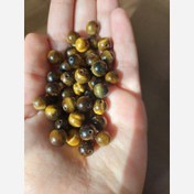 تصویر مهره سنگ چشم ببر سایز8 سوراخ دار درجه یک با تلالوئی بی نظیر طبیعی گوی 