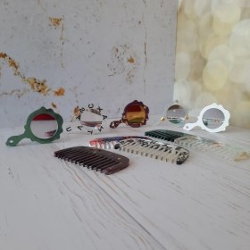 تصویر شانه و آینه جیبی 