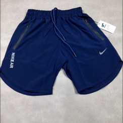 تصویر شلوارک ورزشی مردانه نایکی پارچه آیرو رنگ مشکی و سبز 