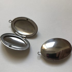 تصویر لاکت بیضی استیل 4*3 سانتی 