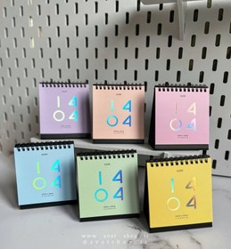 تصویر تقویم رومیزی ۱۴۰۴ طرح دختر و گربه 