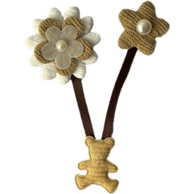 تصویر تکه‌دوزی خرس با گل و آویز 