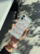 تصویر قاب شفاف پاپیونی آویز دار آیفون 16 Case pink ribbon shine iphone 16