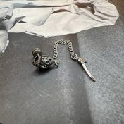 تصویر پرسینگ گوش اویز دار 