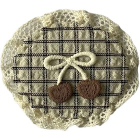 تصویر تکه‌دوزی طرح دایره با گلدوزی قلب 