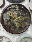 تصویر ساعت دیواری آویسا کد111 چرخ دنده متحرک - قهوه ای 